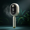 Electric Spray Massage Comb beauty shot with mist
